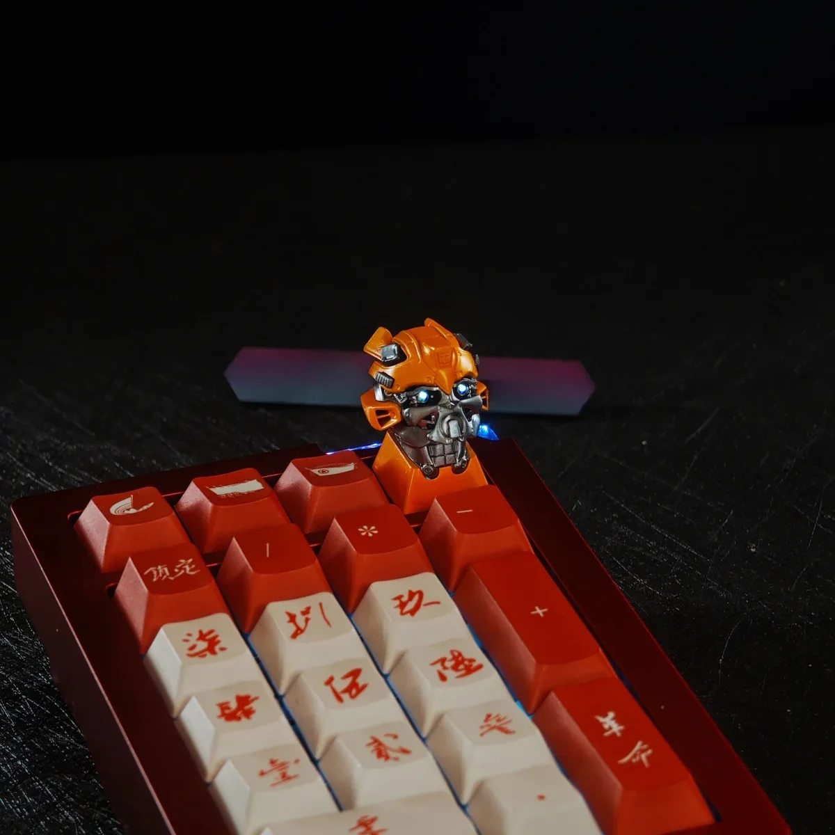 Bumblebee keycap showcasing translucent resin for backlighting