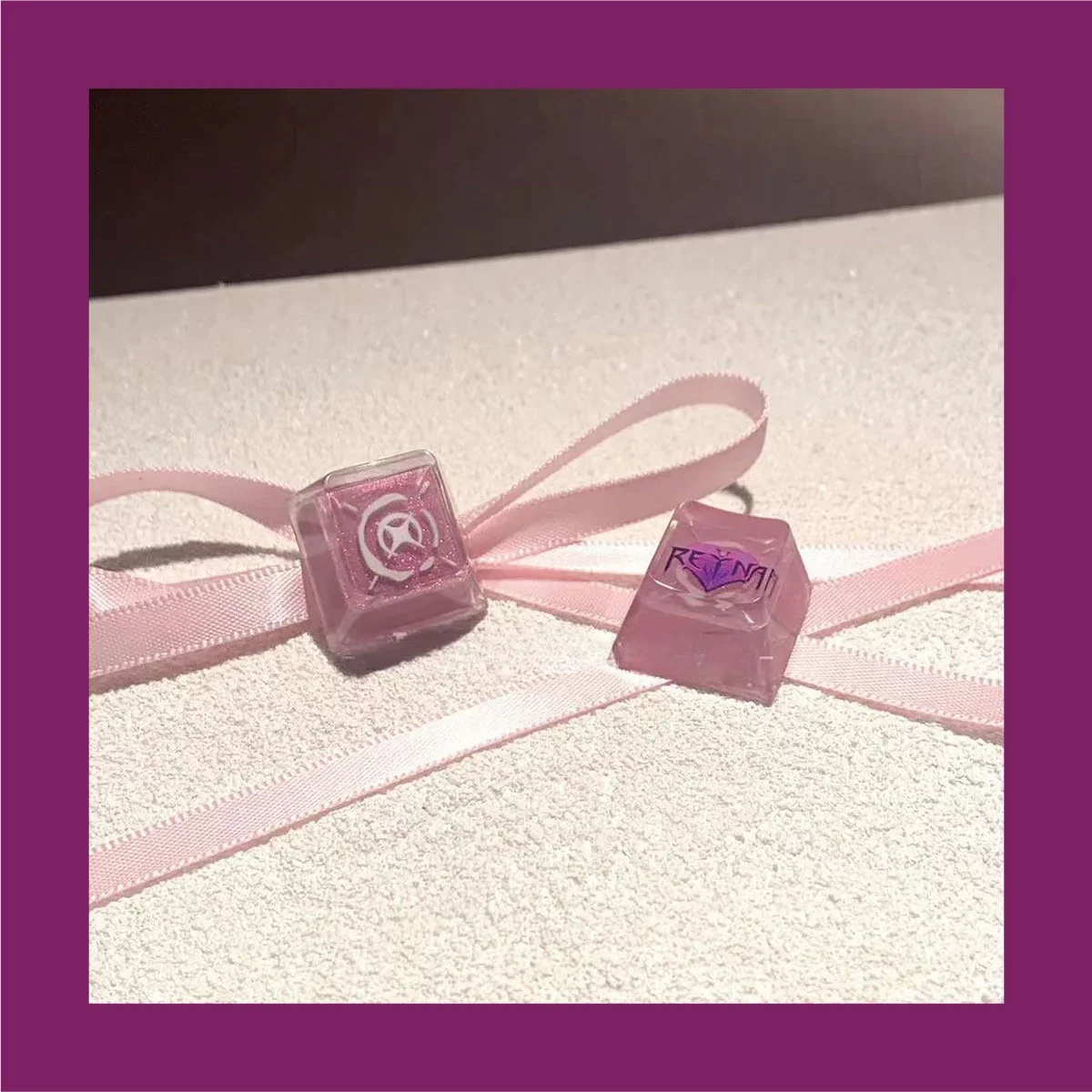 Valorant Reyna keycap with vibrant backlighting on a mechanical keyboard