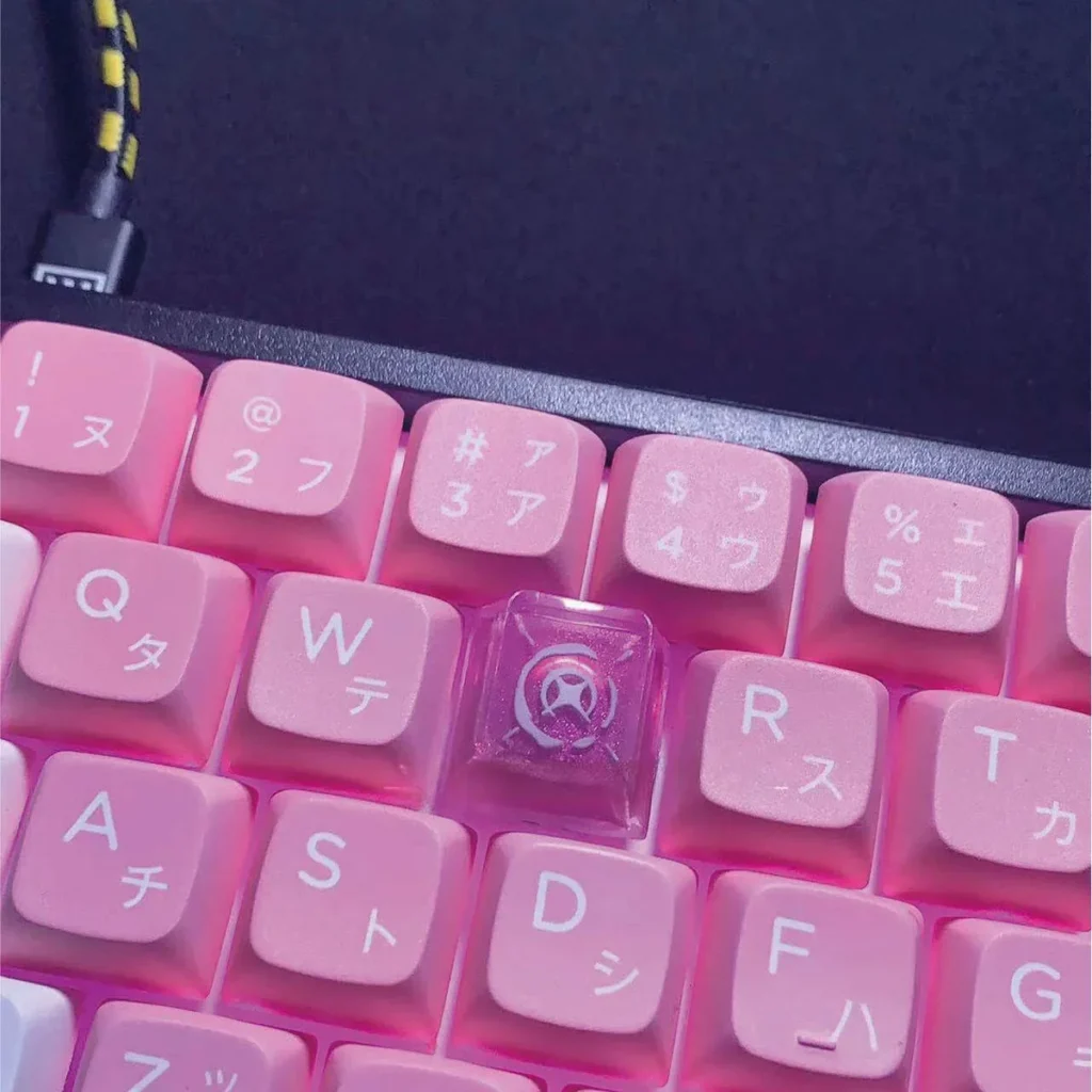 Detailed shot of the resin craftsmanship and hand-painted elements of Reyna keycap