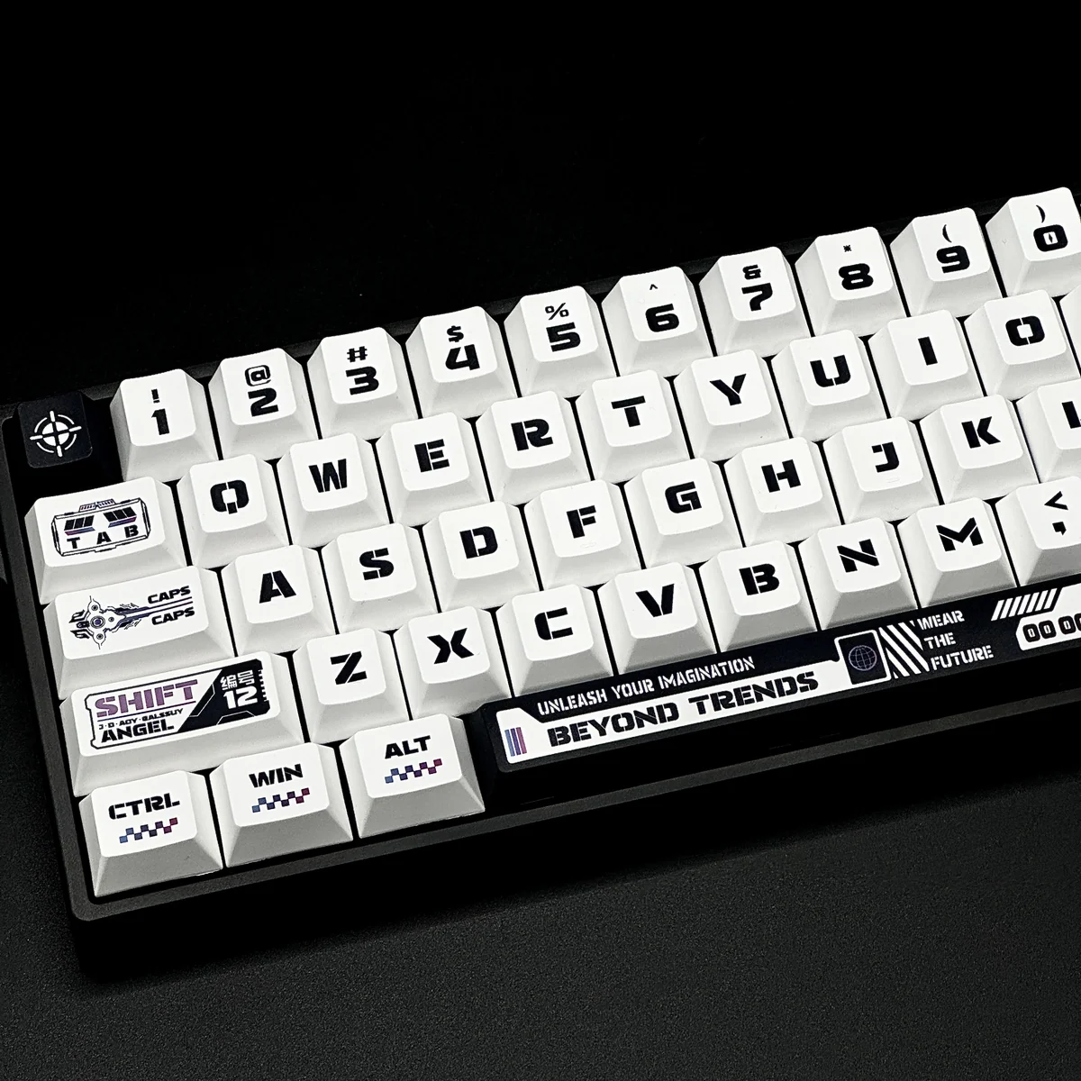 Close-up of Warframe themed PBT keycaps showing dye-sublimated legends