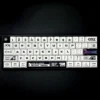 Warframe PBT Keycap Set with intricate sci-fi designs on a mechanical keyboard