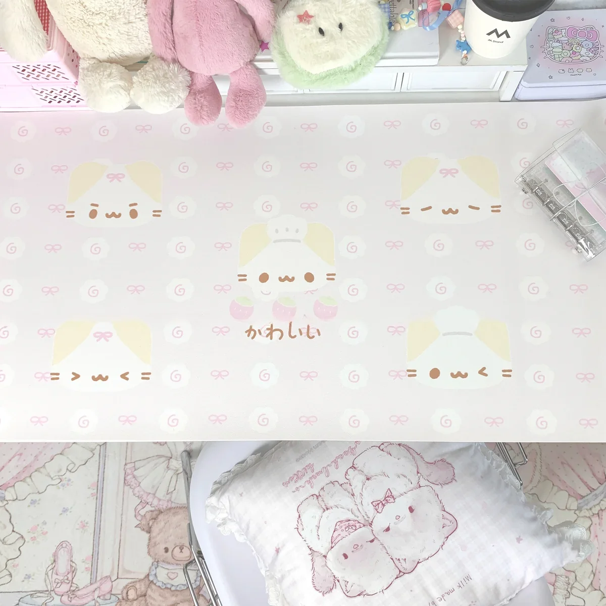 Marshmallow Cat Desk Mat on a working space environment