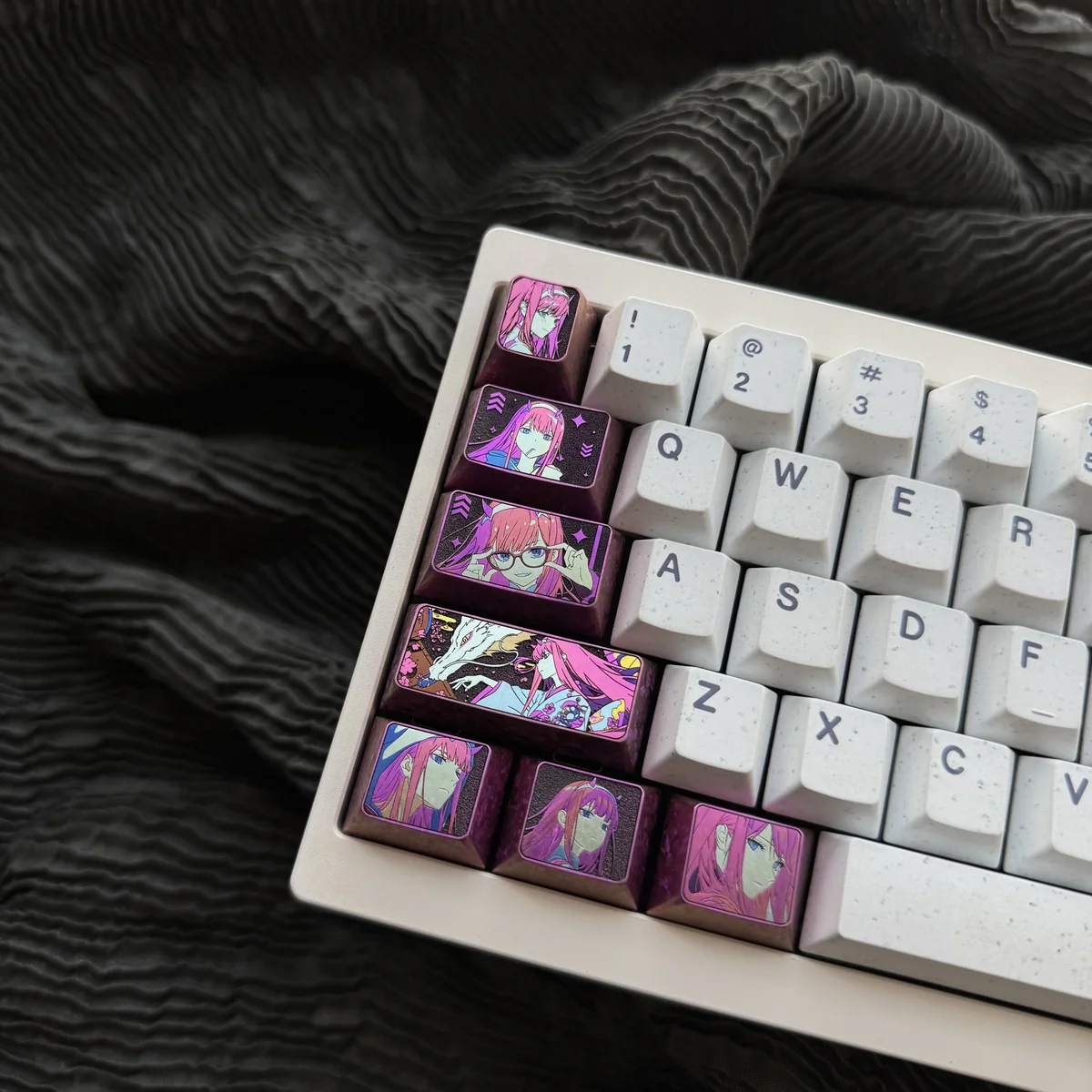 Close-up of sculpted Zero Two keycap details