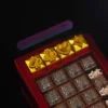 Angled view of the durable zinc alloy Poker Suits Keycap highlighting its metallic finish.