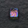 Artisan keycap on a keyboard, emphasizing its premium texture and craftsmanship