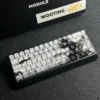 Detailed shot of a Samurai Ronin character keycap, emphasizing the unique black and white design.