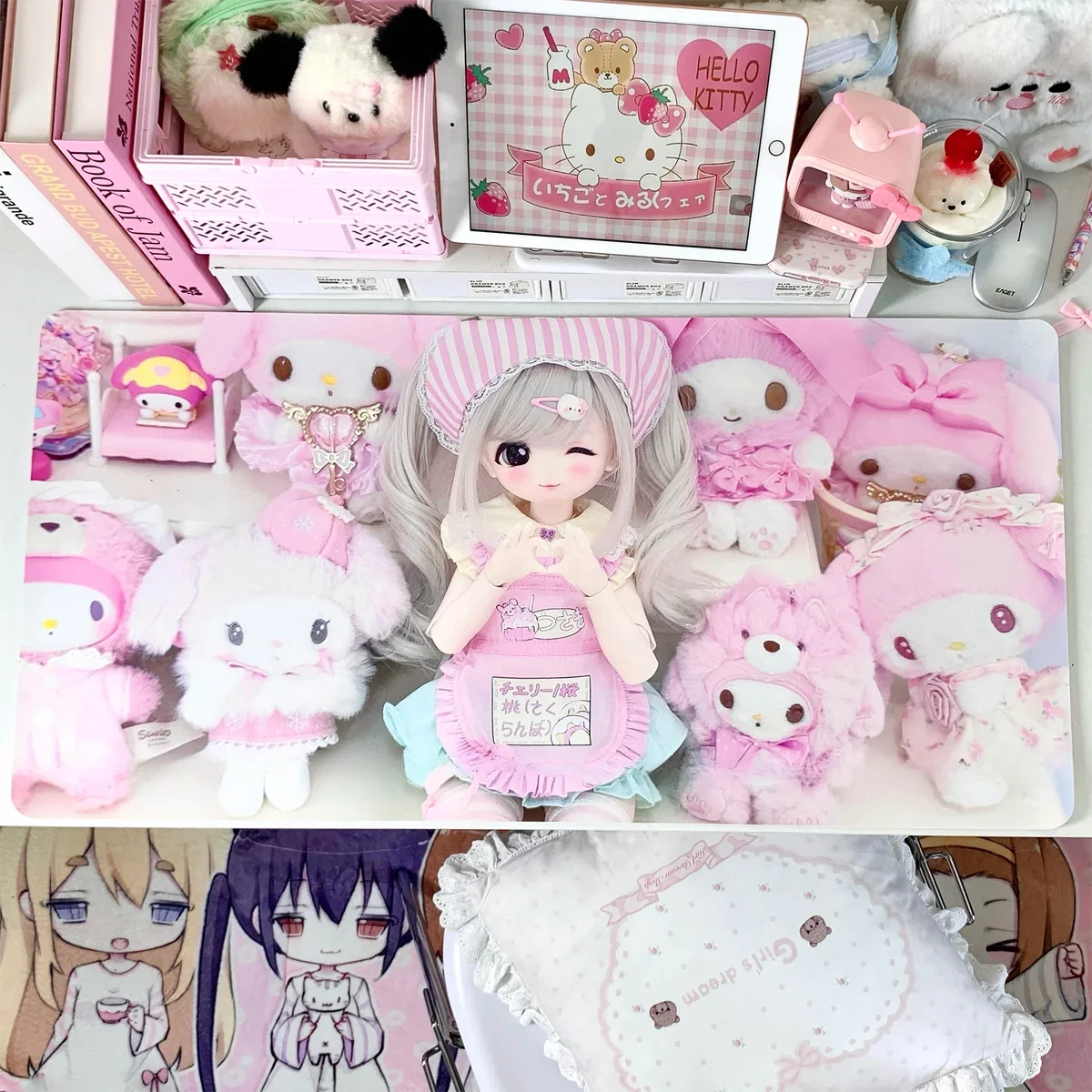 Full desktop setup featuring BJD Doll Pink Desk Mat, desktop accessories
