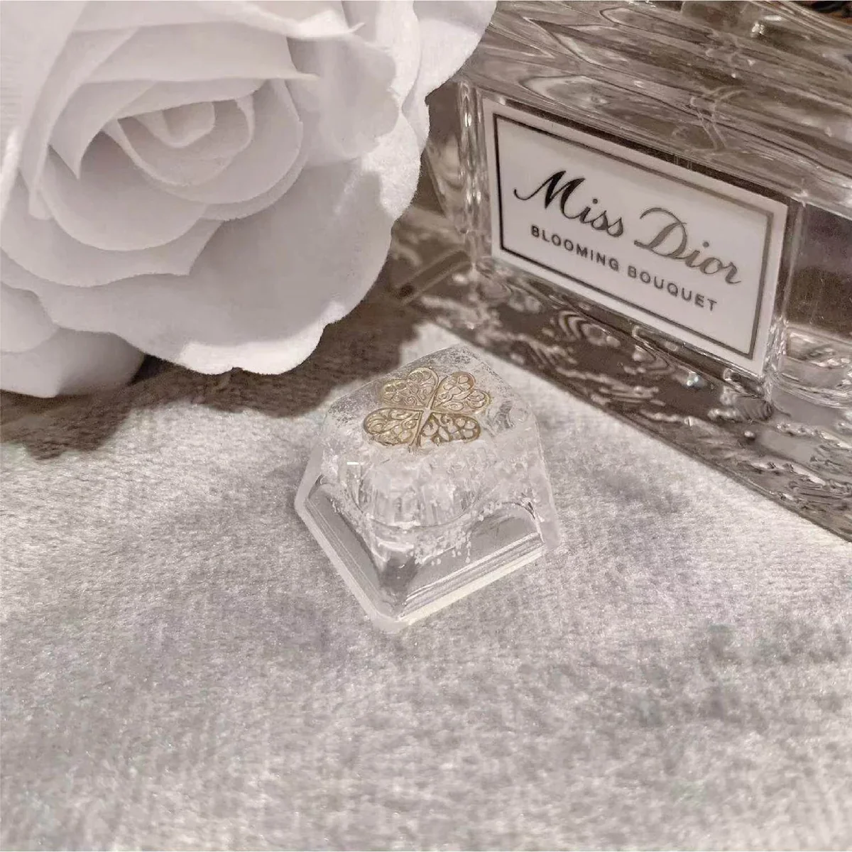 Detailed view of handcrafted resin butterfly and window diorama in keycap