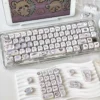 Close-up of Chiikawa Momonga keycaps showing side-printed translucent legends