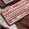 Detailed shot of translucent heart keycaps glowing with subtle RGB backlighting