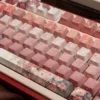 Close-up of a Closer Heart PBT keycap showing dye-sublimated legend and translucent heart detail