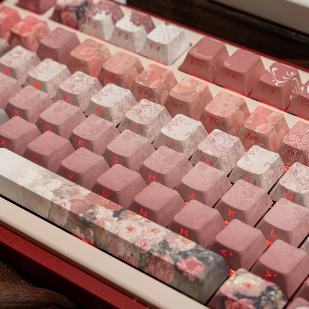 Close-up of a Closer Heart PBT keycap showing dye-sublimated legend and translucent heart detail