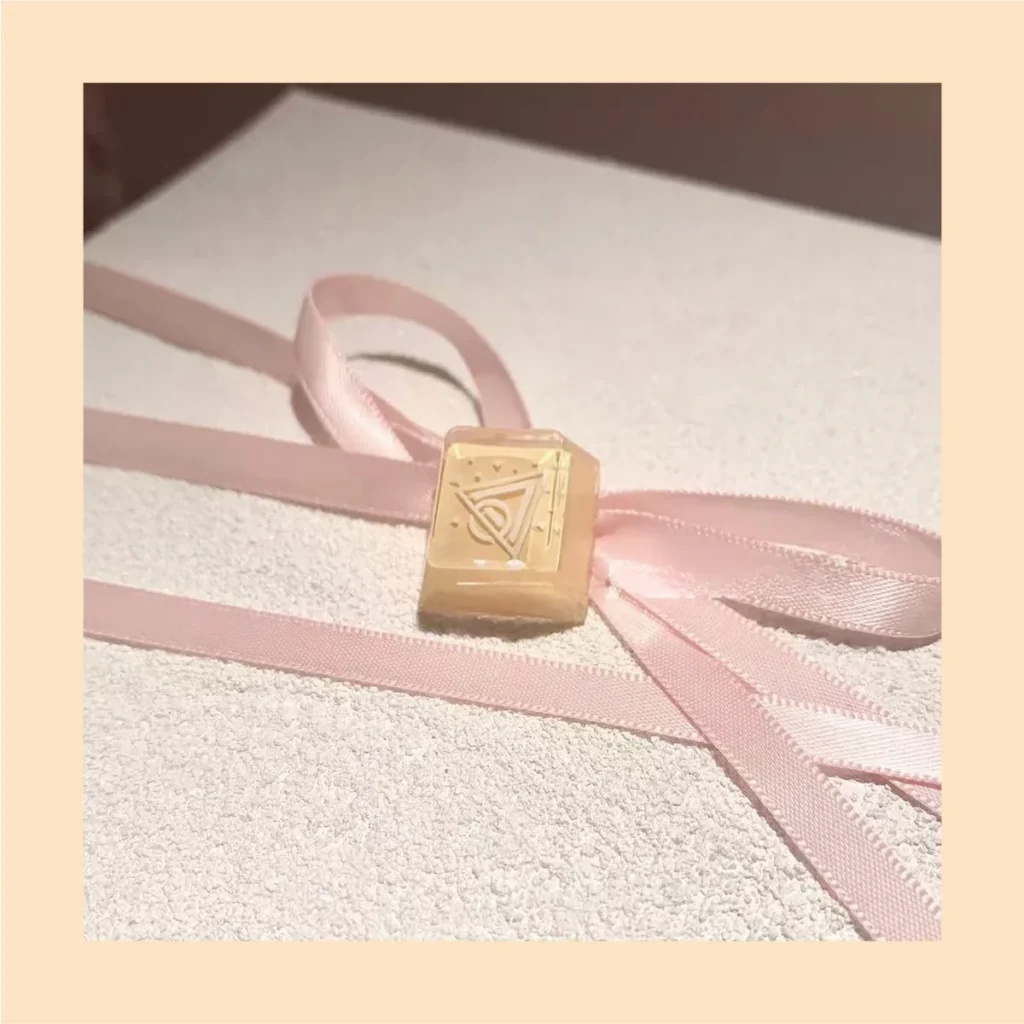 Collection of artisan keycaps, featuring the Killjoy Nanoswarm keycap as a centerpiece, emphasizing its unique collectible value.