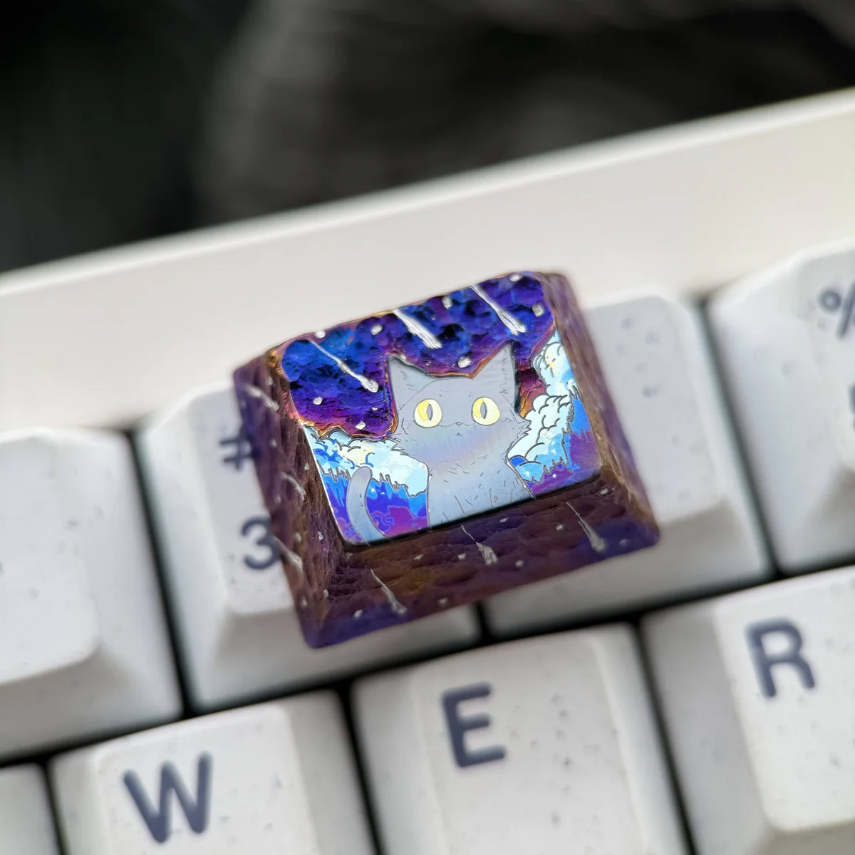 Cosmic Purple Starry Sky Handcrafted titanium installed on a mechanical keyboard setup