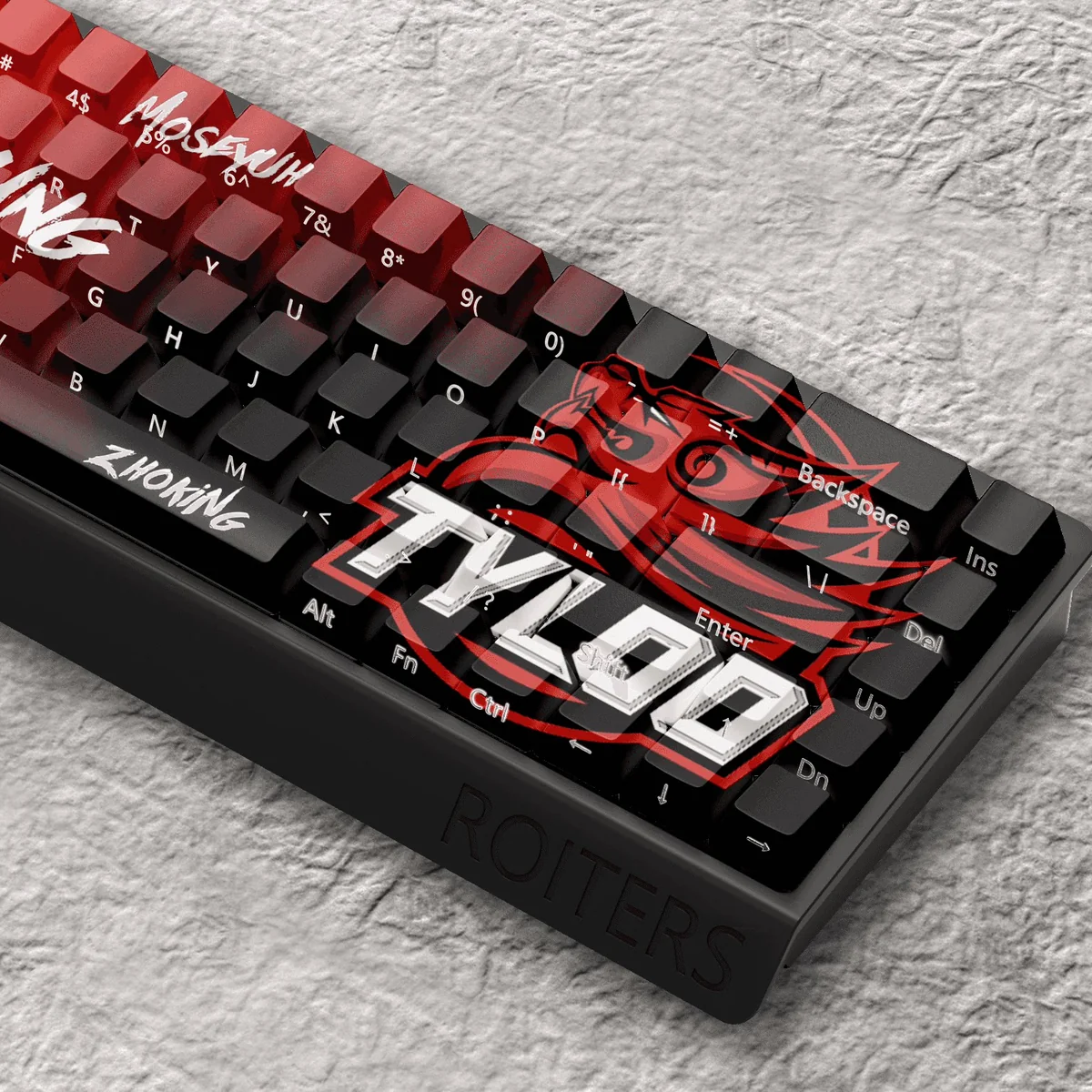 Close-up of CS:GO TYLOO keycaps, highlighting dye-sublimated legends and PBT texture