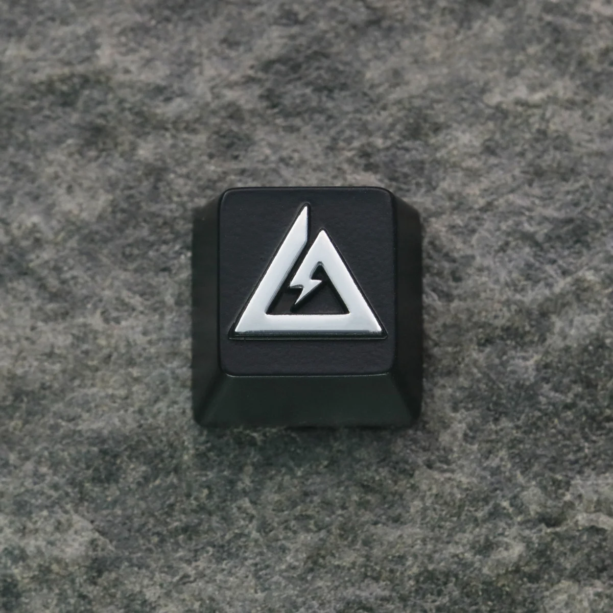 Textured view of Delta Force keycap, highlighting the forged zinc-aluminum alloy material