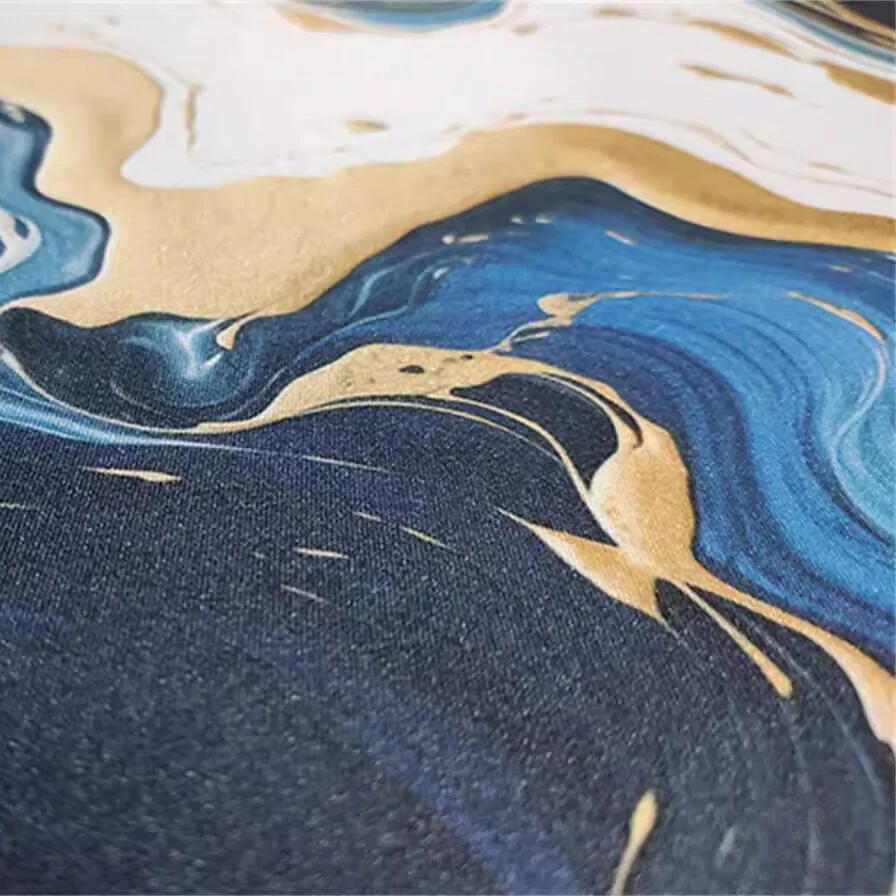 Close-up of the Dynamic Flow Mouse Pad showing waterproof fabric texture and non-slip rubber base