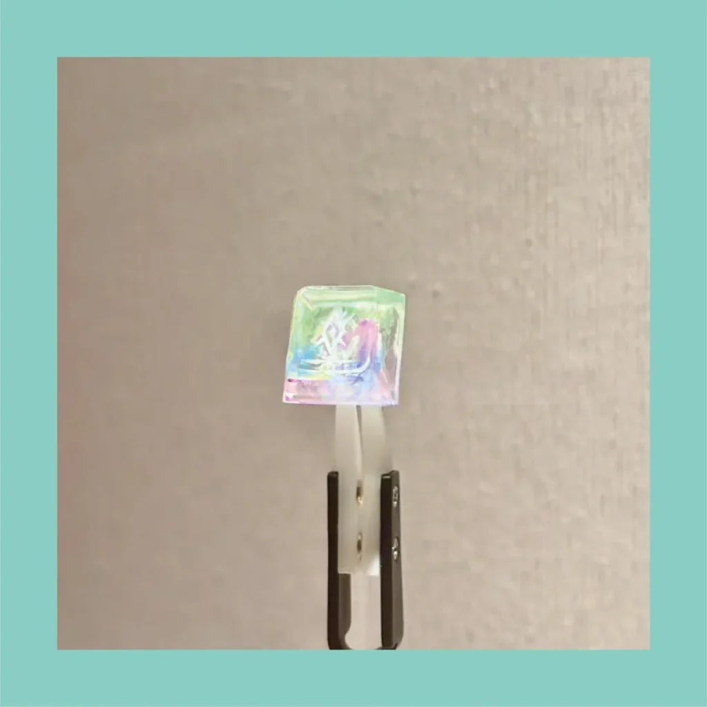 Dynamic view of resin Waylay Skill keycap highlighting vibrant light effects