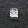 Hand holding the Explosion Keycap, emphasizing its premium weight and intricate design