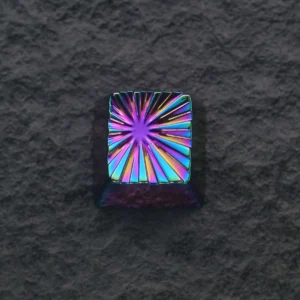 Macro shot of the iridescent electroplated finish on the Explosion Keycap
