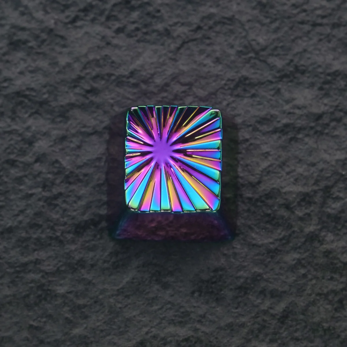 Macro shot of the iridescent electroplated finish on the Explosion Keycap
