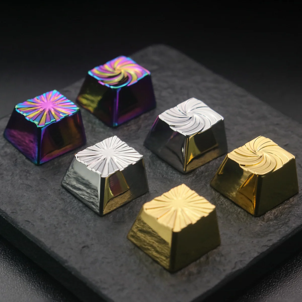 Top-down view of the zinc alloy Explosion Keycap highlighting its unique texture and color shift