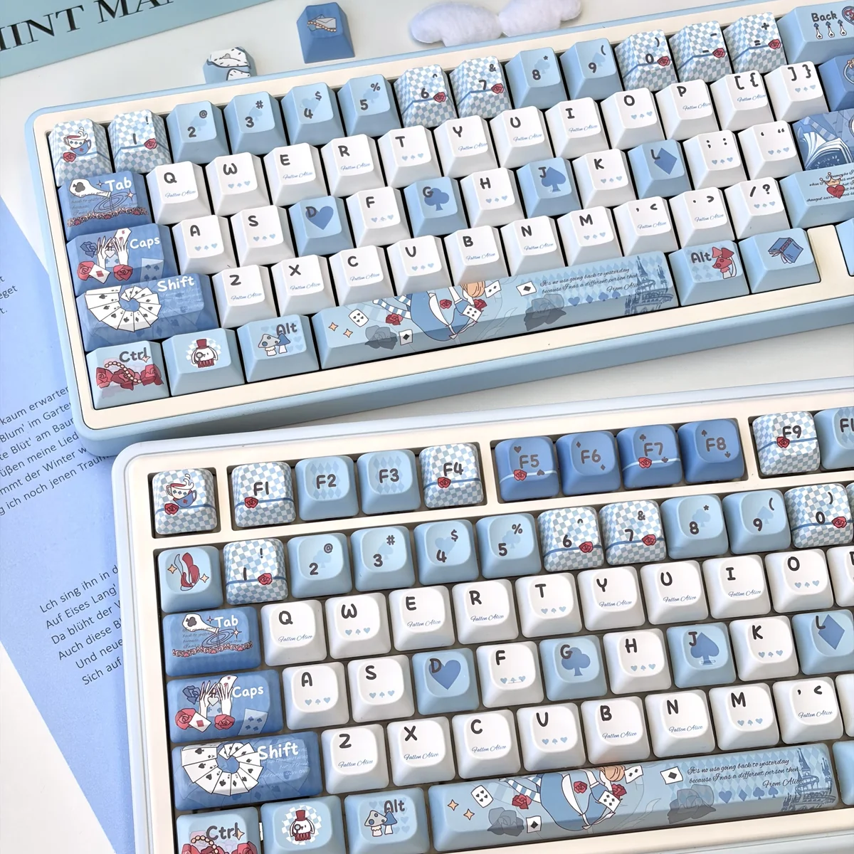Close-up of a Fallen Alice themed keycap with intricate dark fantasy details