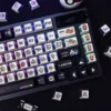 Full view of a keyboard featuring the Pokemon Mega Pixel RGB translucent keycap set in a gaming setup