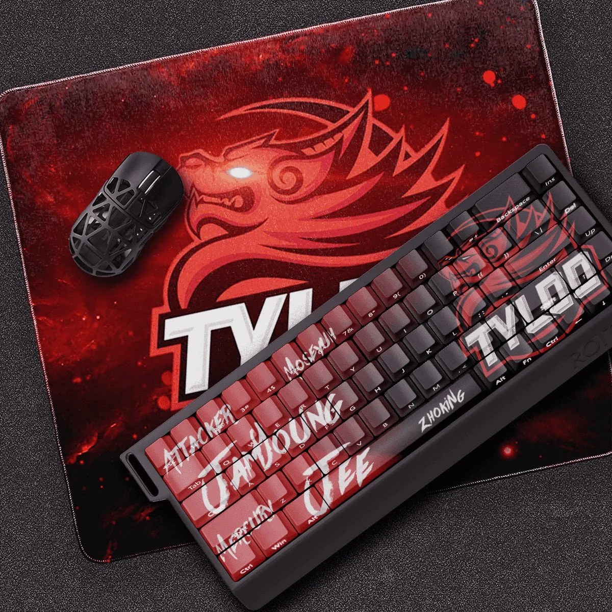 Gaming setup featuring the CS:GO TYLOO PBT Keycap Set, in action