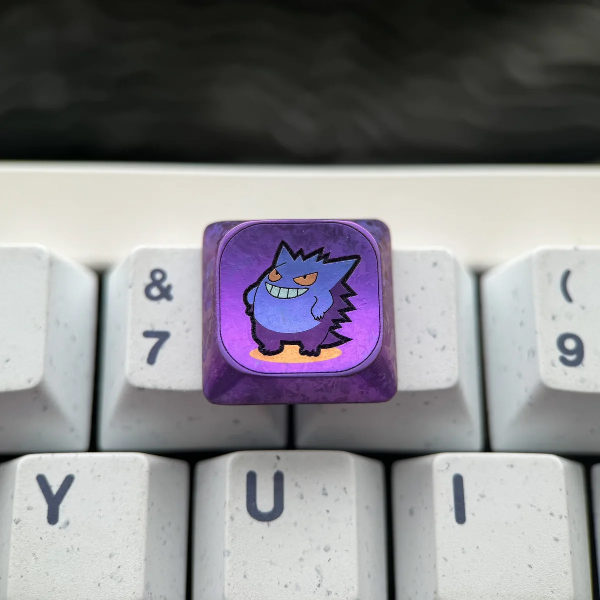 Gengar titanium keycap installed on an MX-style switch, full keyboard view