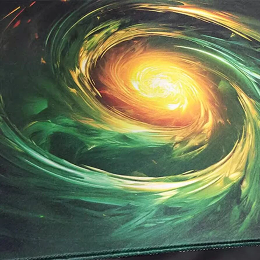 Side view of the Gold Green Vortex Mouse Pad, showcasing its stitched edges and non-slip rubber base.