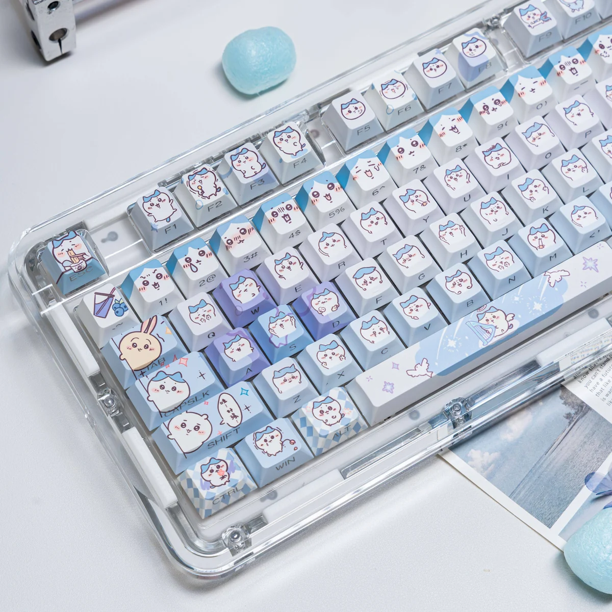 Close-up of a side-engraved translucent Hachiware keycap showcasing legend detail