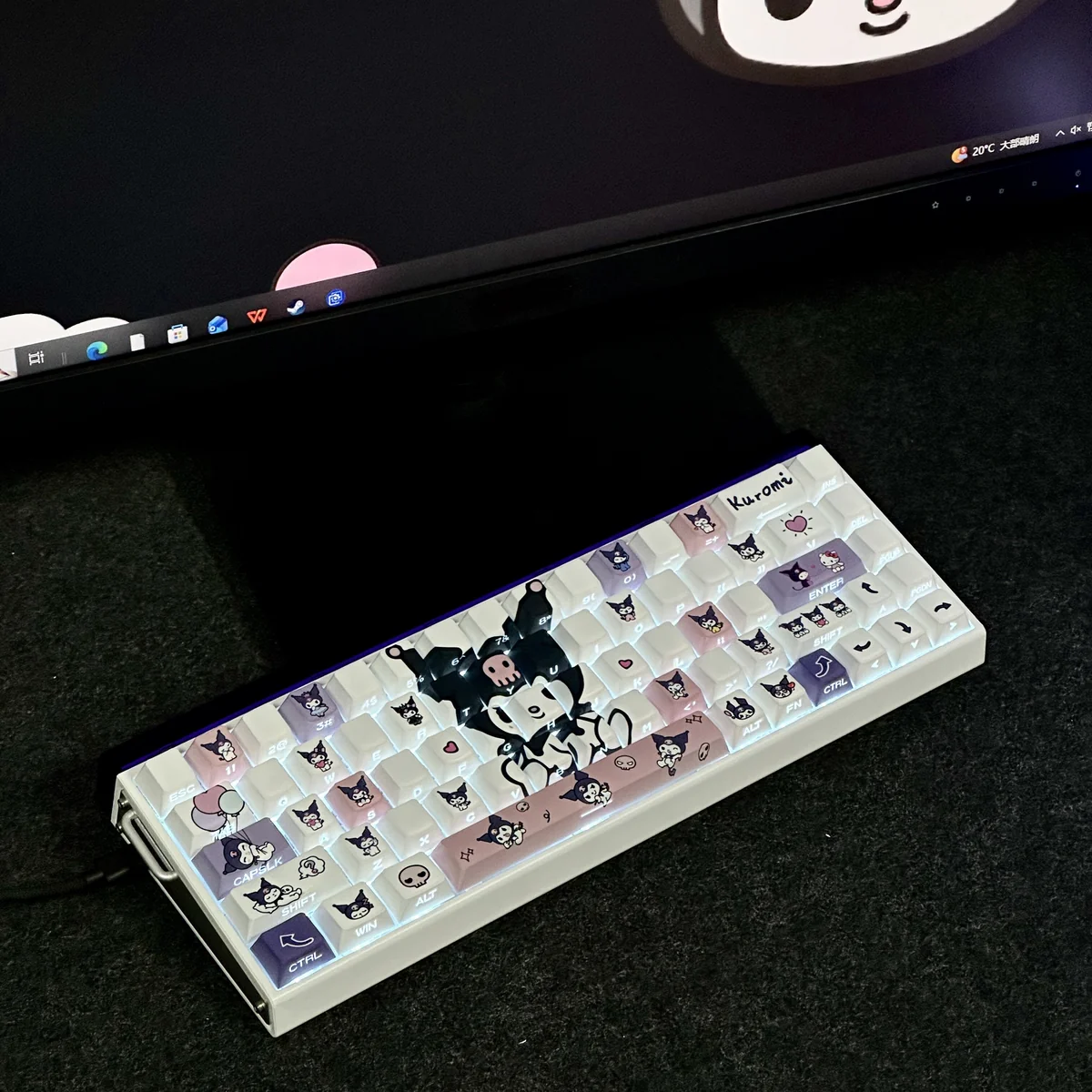 Detail shot of a Kuromi-themed keycap, highlighting the artisan craft and unique texture