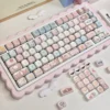 Little Lamb PBT MOA Keycap Set on a white mechanical keyboard, showcasing whimsical lamb and dessert designs.