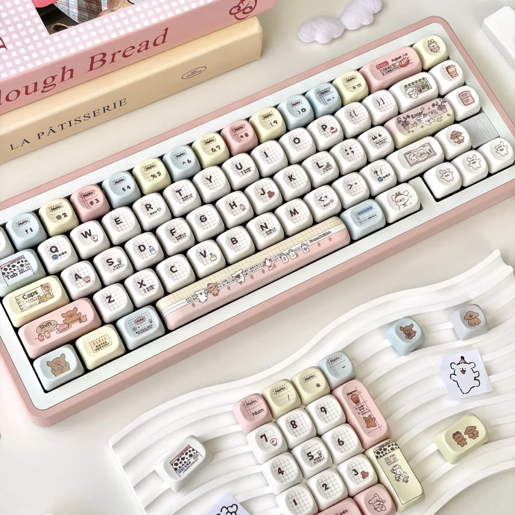 Maltese Dog MOA PBT Keycap Set featuring whimsical animal and dessert designs on a mechanical keyboard