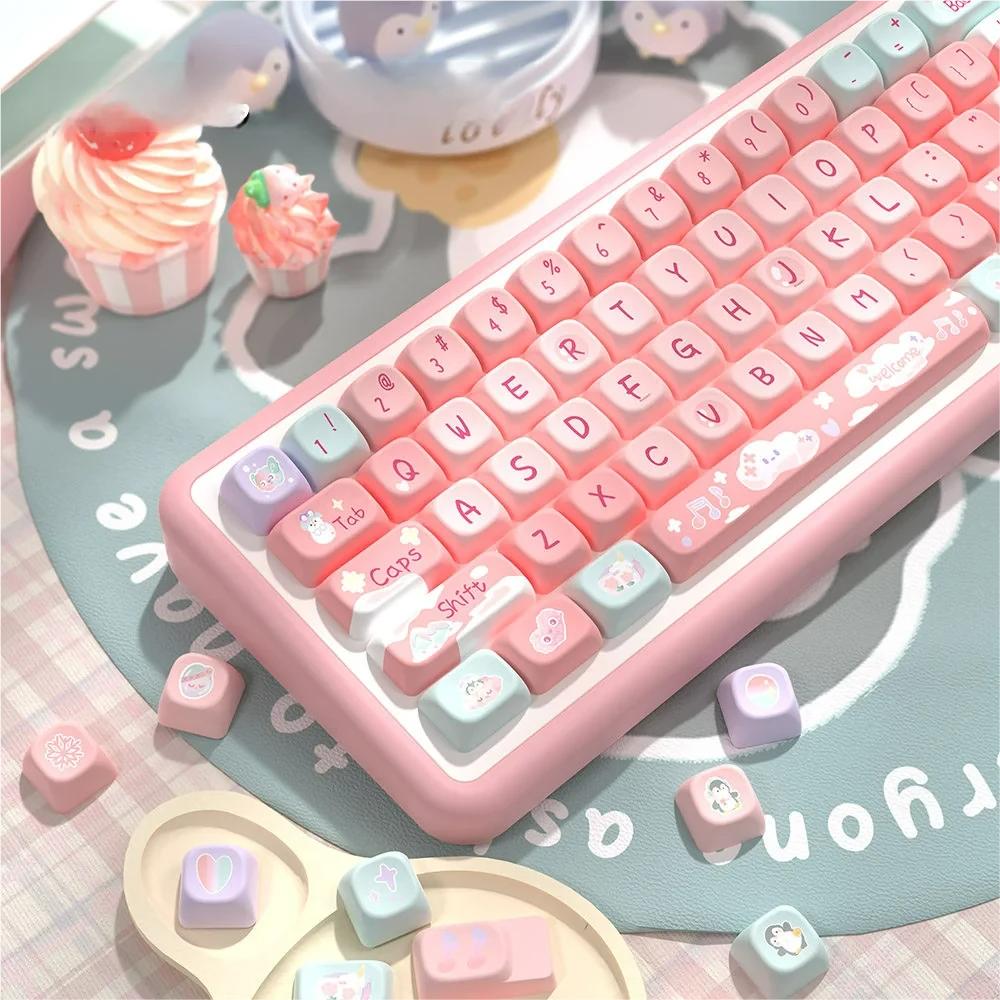 A serene desktop setup featuring a mechanical keyboard adorned with the Pink Glacier Keycap Set, blending pinks, whites, and blues.