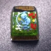 Side profile of Pokemon Mew Transparent Keycaps Exquisite artisan showing artisan keycap shape and fit