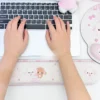 Lifestyle shot of Sugarbunnies Wrist Pad & Wrist Restwith cute bunny and dessert motifs on a desk setup