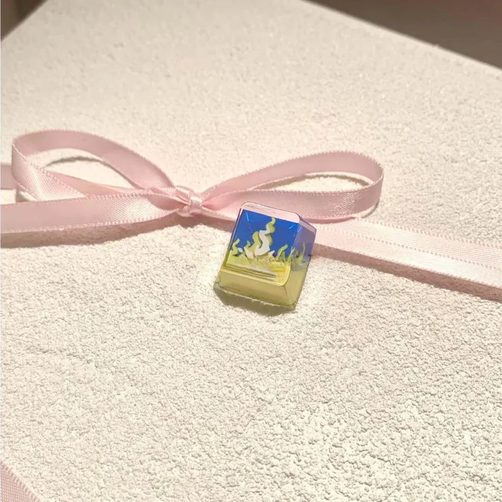Valorant Neon Skill keycap handcrafted from transparent resin on a mechanical keyboard, showcasing vibrant light-through effects.