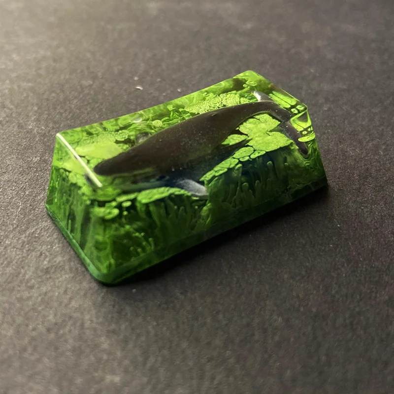 Whale Fall Resin Keycap glowing on a mechanical keyboard