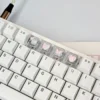 Side view of XDA profile Pink Butterfly Heart keycaps, highlighting uniform height and transparent resin