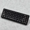Black Gold Baroque keycap set mounted on a sleek black mechanical keyboard, demonstrating aesthetic harmony.