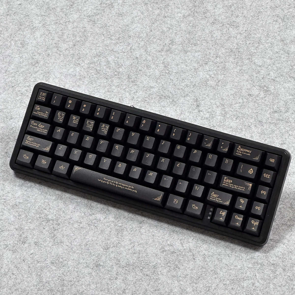 Black Gold Baroque keycap set mounted on a sleek black mechanical keyboard, demonstrating aesthetic harmony.
