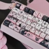 Close-up of dye-sublimated black cat keycap design