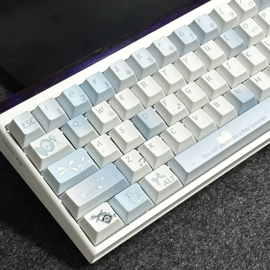 Close-up of Blue Melody dye-sub PBT keycaps, highlighting the smooth texture and crisp legends.