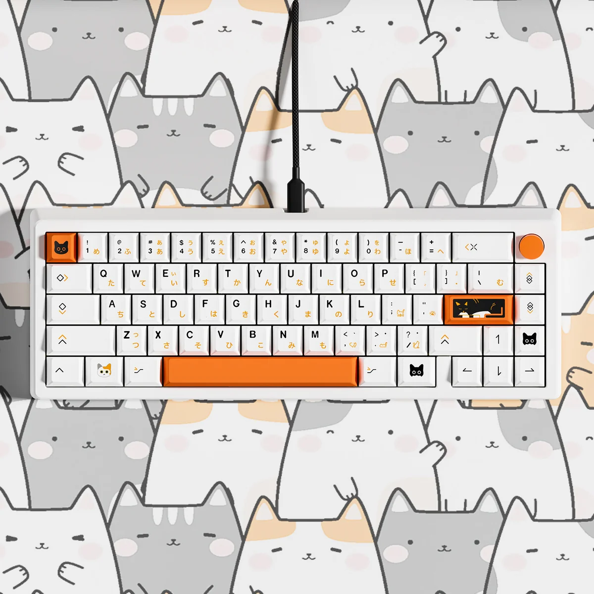 A keyboard equipped with the Calico Cat Keycap Set, set in a whimsical, comforting desk environment.