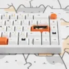 Detailed view of various Calico Cat themed keycaps, including novelty keys with unique cat illustrations.