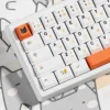 Close-up of Calico Cat keycaps, highlighting the crisp dye-sublimation and PBT texture.