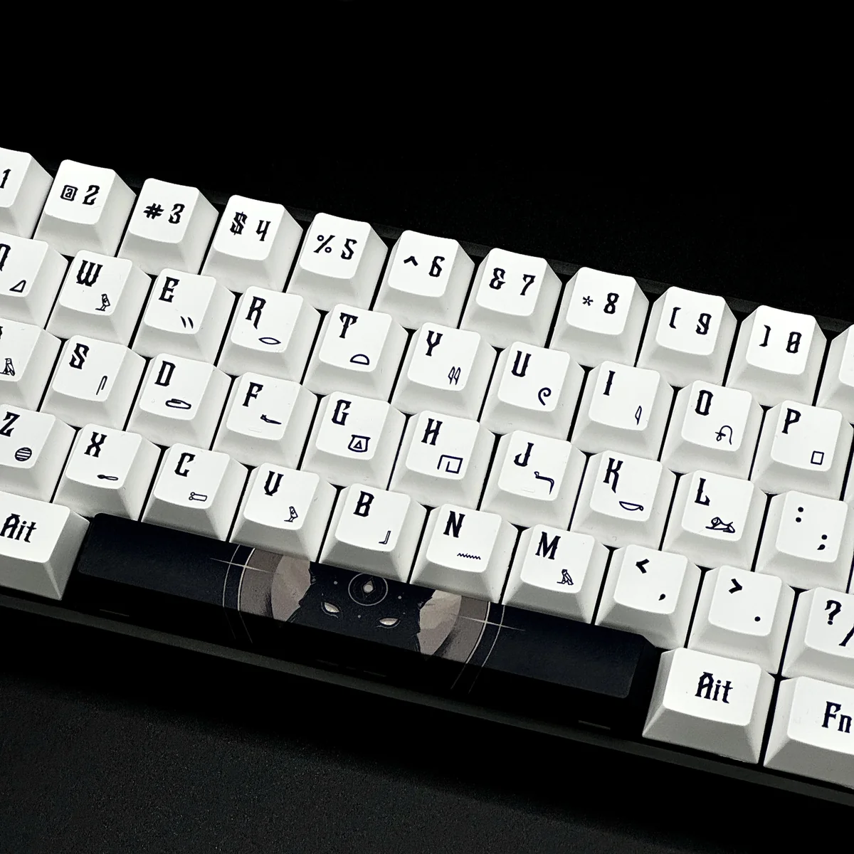 Side view of Cherry profile PBT keycaps with ancient Egyptian themed legends