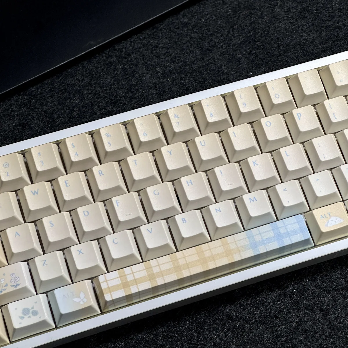 Top-down view of the Cloud Floral Keycap Set installed, demonstrating full layout compatibility
